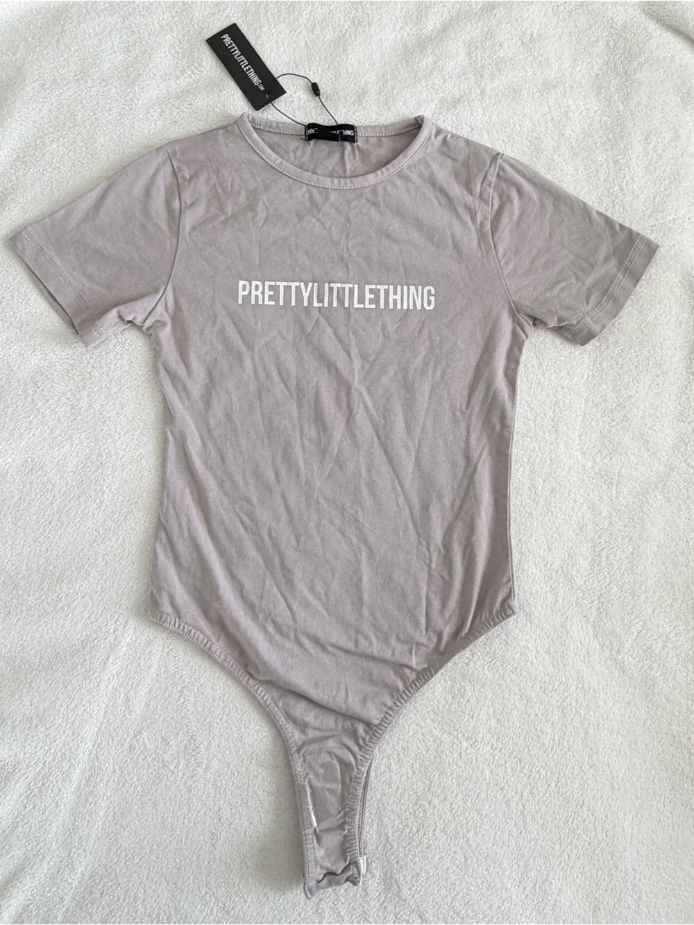 PrettyLittleThing Light Taupe Logo Tee Bodysuit
